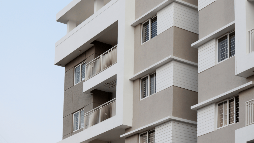 an apartment building with balconies and balconies