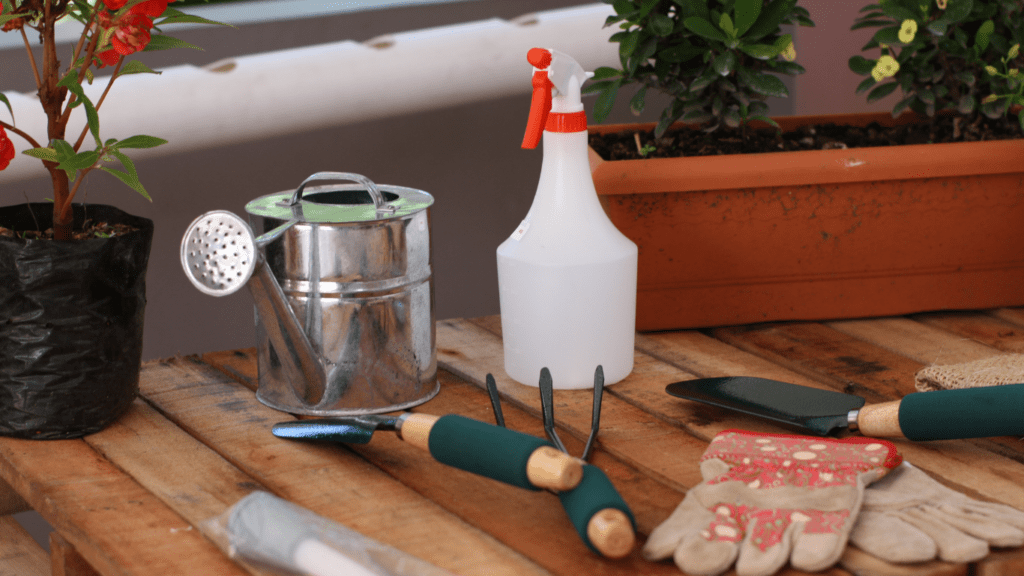 gardening tools on a wooden table