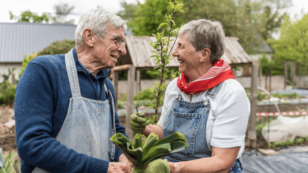 two people are working in the garden together